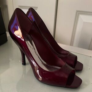 Ruby patent heels